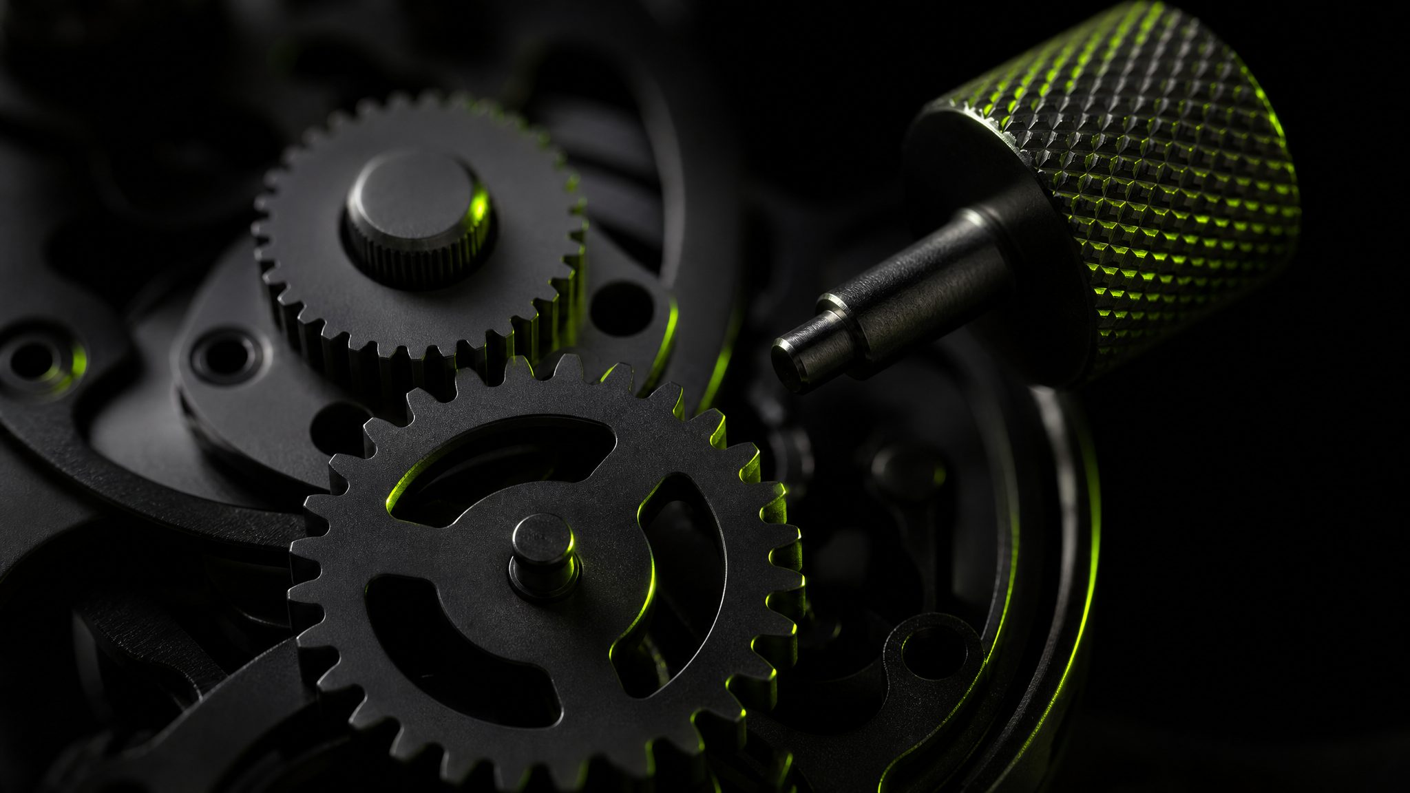 Machined black gears and a knurled tuning knob with green edge light