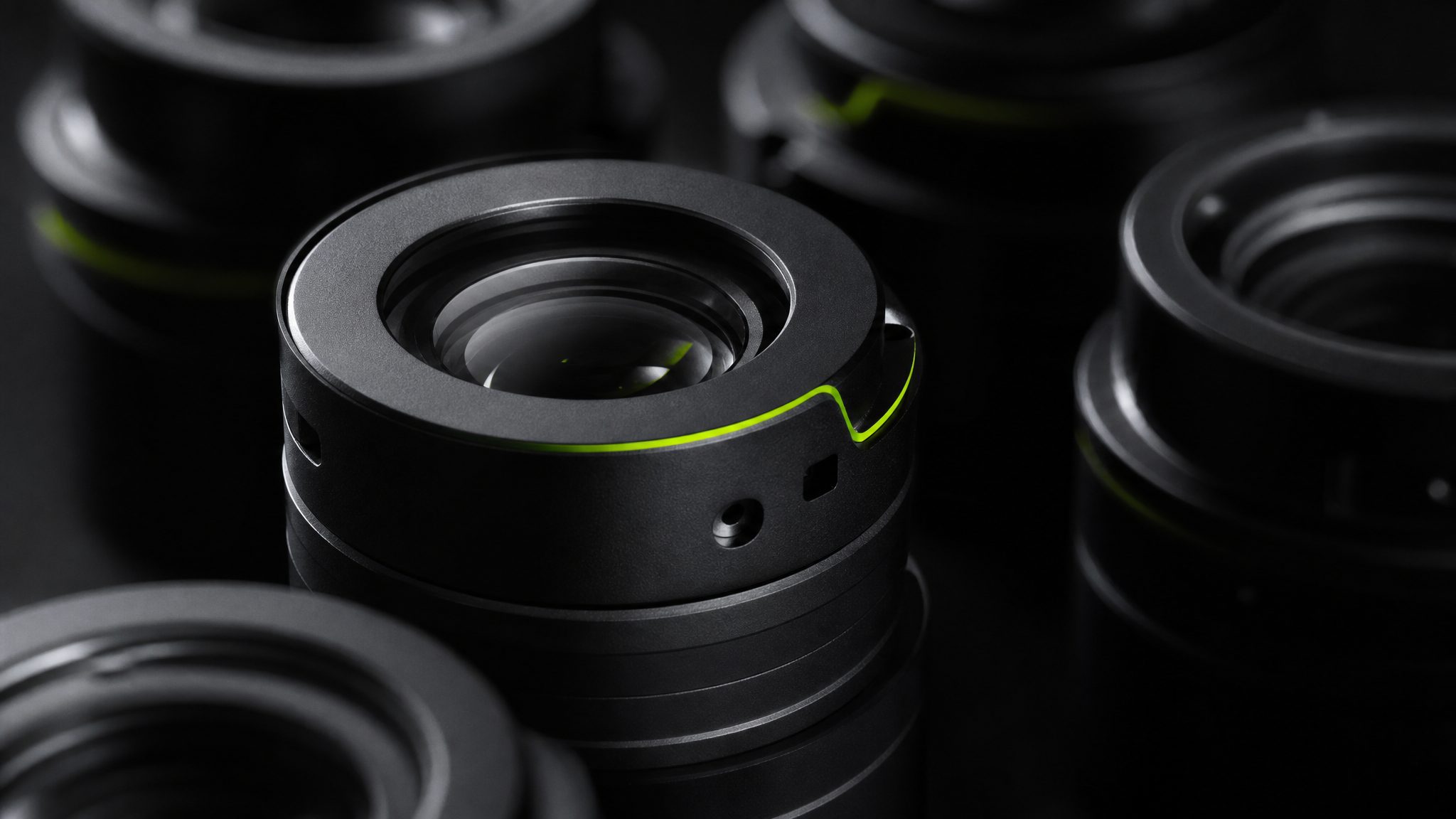 Precision optical lens array in darkness with a single green light edge